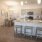 a kitchen with a bar and stools