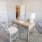 a room with a table and chairs