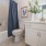 a bathroom with a tub toilet and sink