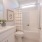 a bathroom with a tub sink and toilet beaumont oaks at porters neck wilmington nc