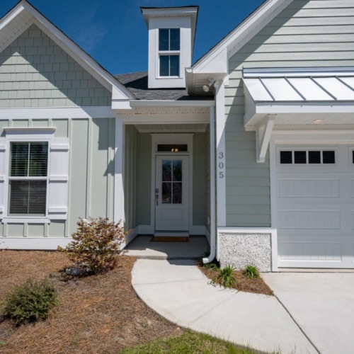 A perfect fit for the whole family a grey house with a garage beaumont oaks at porters neck wilmington nc