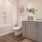 a bathroom with a tub toilet and sink